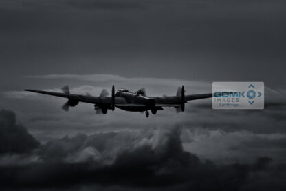 A Lancaster Bomber takes off into a moonlit sky