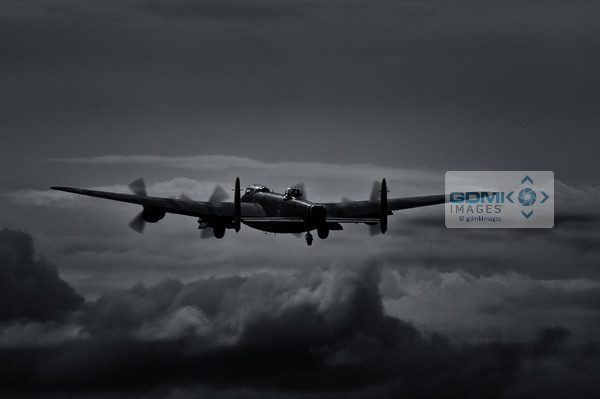 Moonlit Lancaster A Lancaster Bomber takes off into a moonlit sky