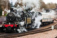 Lots of steam from a double headed steam train standing in the platform at Leicester North railway station on the Great Central Railway