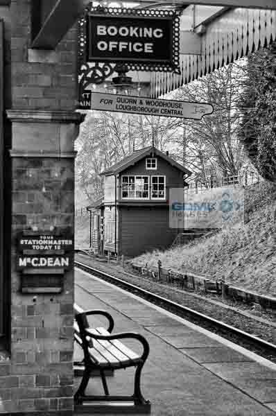 View along the platform towards a signalbox at Rothley station on the Great Central Railway