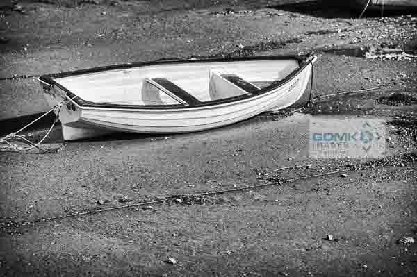 Black And White Dinghy Black annd White photo of a dinghy at low tide on the River Teign near Shaldon