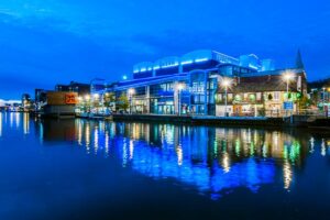 Lights from the waterfront buildings reflected in Brayford Pool Lincoln