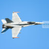 Top side view of a Finnish F-18 Top side view of a Finnish F-18 aircraft in a tight turn during an airshow display