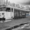 Black and white photo of Class 50 loco 50015 Valiant at Bury Railway Station 50015 Valiant standing in the rain at Bury Railway Station on the East Lancs Railway during the English Electric theme day on 11th January 2014. The class 50 is heading a service to Heywood.
