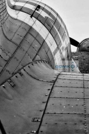 Rear view along the fuselage of a C-47 Dakota WW2 Troop Carrier aeroplane in Black and White