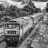 Black and white class 47 hauled train Black and white image of class 45 diesel locomotive D1705 recreating a scene from the 1970s and 80s as it heads a train on the Great Central Railway near Loughborough