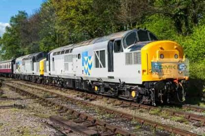 English Electric Class 37 locos 37227 and 37905 in Railfreight Metals livery double head a train at Shackerstone on the Battlefield Line