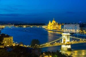 Looking down on the Chain Bridge, River Danube and Parliament building in Budapest in evening light