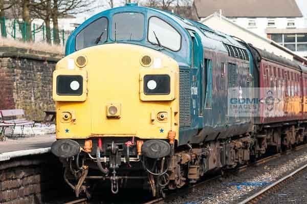 English Electric Class 37 at Bury Class 37 loco in BR Blue colour scheme working a passenger train on the East Lancs Railway