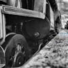 Low angle Bulleid Light Pacific Platform level view of the front of a Bulleid Light Pacific steam loco standing in a platform in black and white