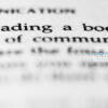 Reading a book Closeup of text saying 'reading a book' in a paperback book