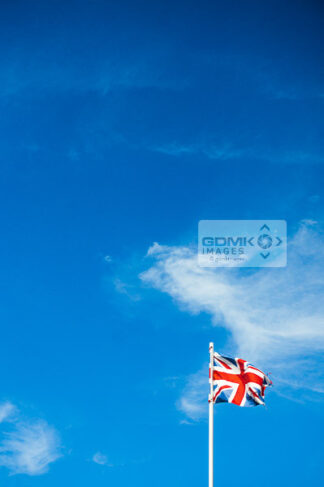 Union Jack flag against a blue sky