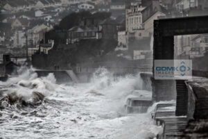 Waves crashing against the sea Wall in Dawlish Digitally processed image of storm driven waves crashing against the sea Wall in Dawlish
