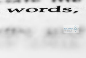 Closeup of text saying 'words' in a paperback book