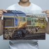 Man Holding GBRF and Freightliner Class 66s Wall Art Print Man Holding GBRF and Freightliner Class 66s Wall Art Print