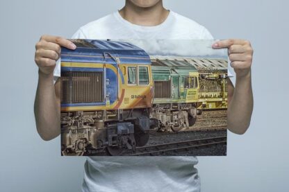 Man Holding GBRF and Freightliner Class 66s Wall Art Print