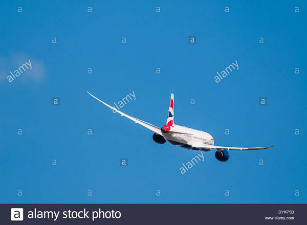 Rear view of a British Airways Boeing 787 Dreamliner plane banking away after takeoff