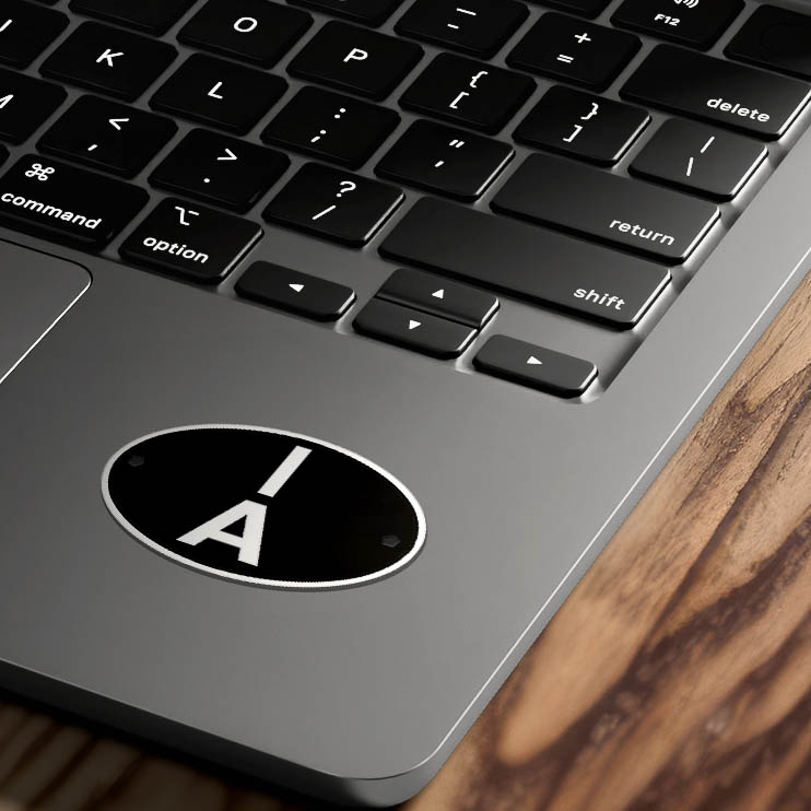 1A Shed Code Sticker on Laptop